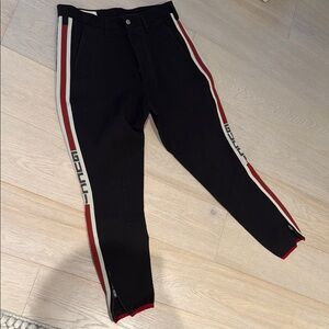 Gucci Black and Red Sweatpants with Sporty Stripe Design